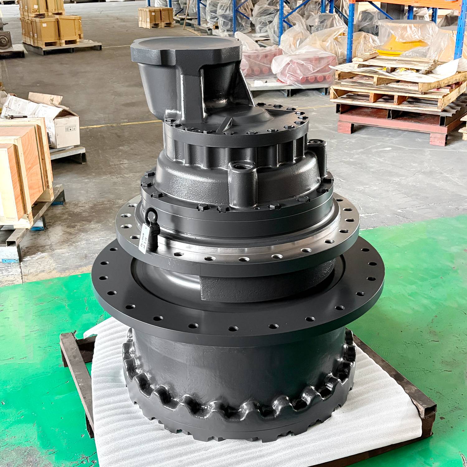 Travel gearbox with sprocket ring, showing the final drive output before installation
